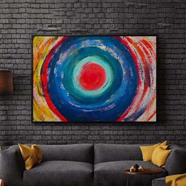MOVEMENTS original circular abstract acrylic painting by Daniel Mikaelian displayed in a modern living room.